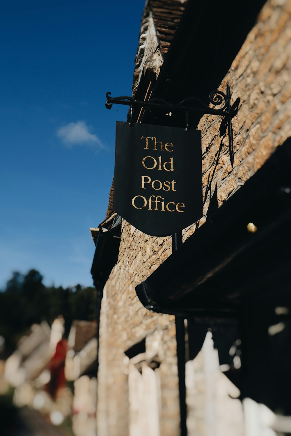 the old post office sign on the side of a building