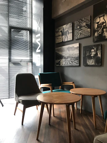 Cozy Scandinavian-style restaurant interior with warm lighting and elegant black and white tones.