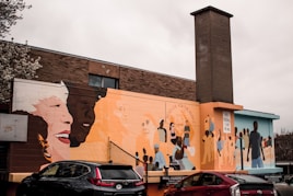 A colorful mural painted by local artists celebrating resilience in the black and Latino communities.