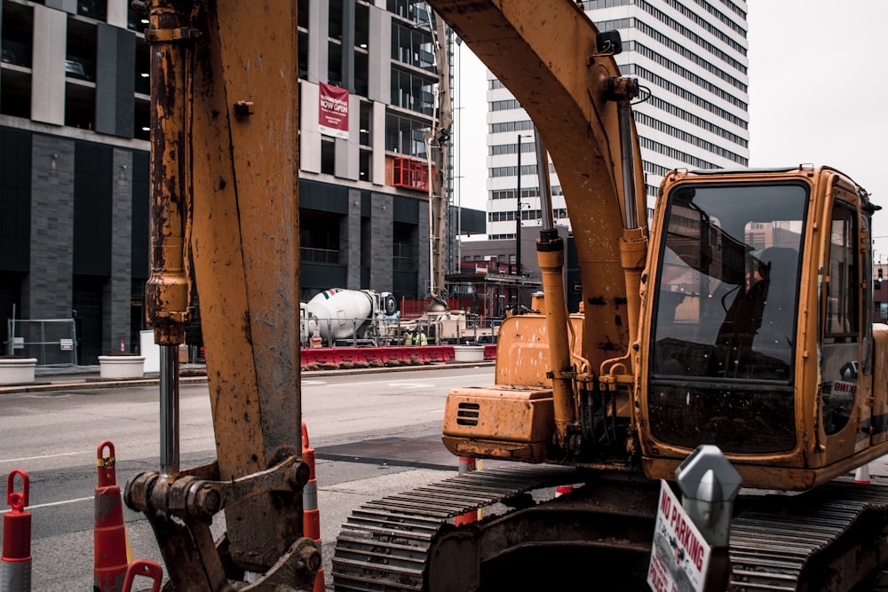 a bulldozer is parked on the side of the road