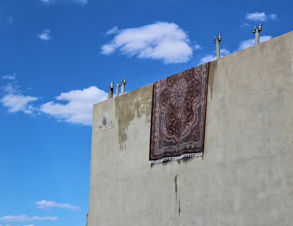 a building with a decorative window on the side of it