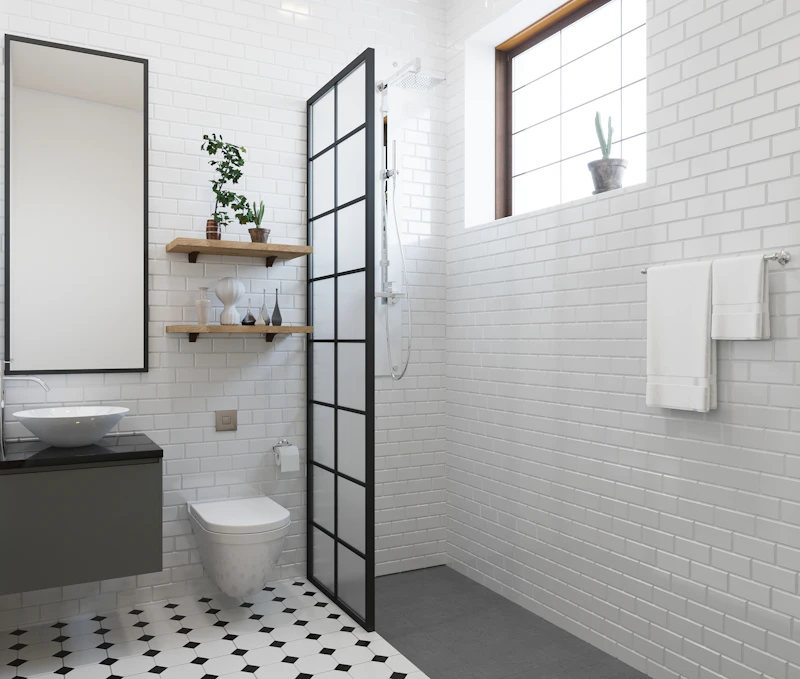 Bathroom with a toilet, sink and shower