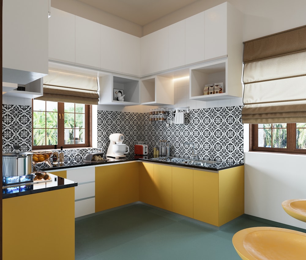 a kitchen with a yellow counter and yellow chairs