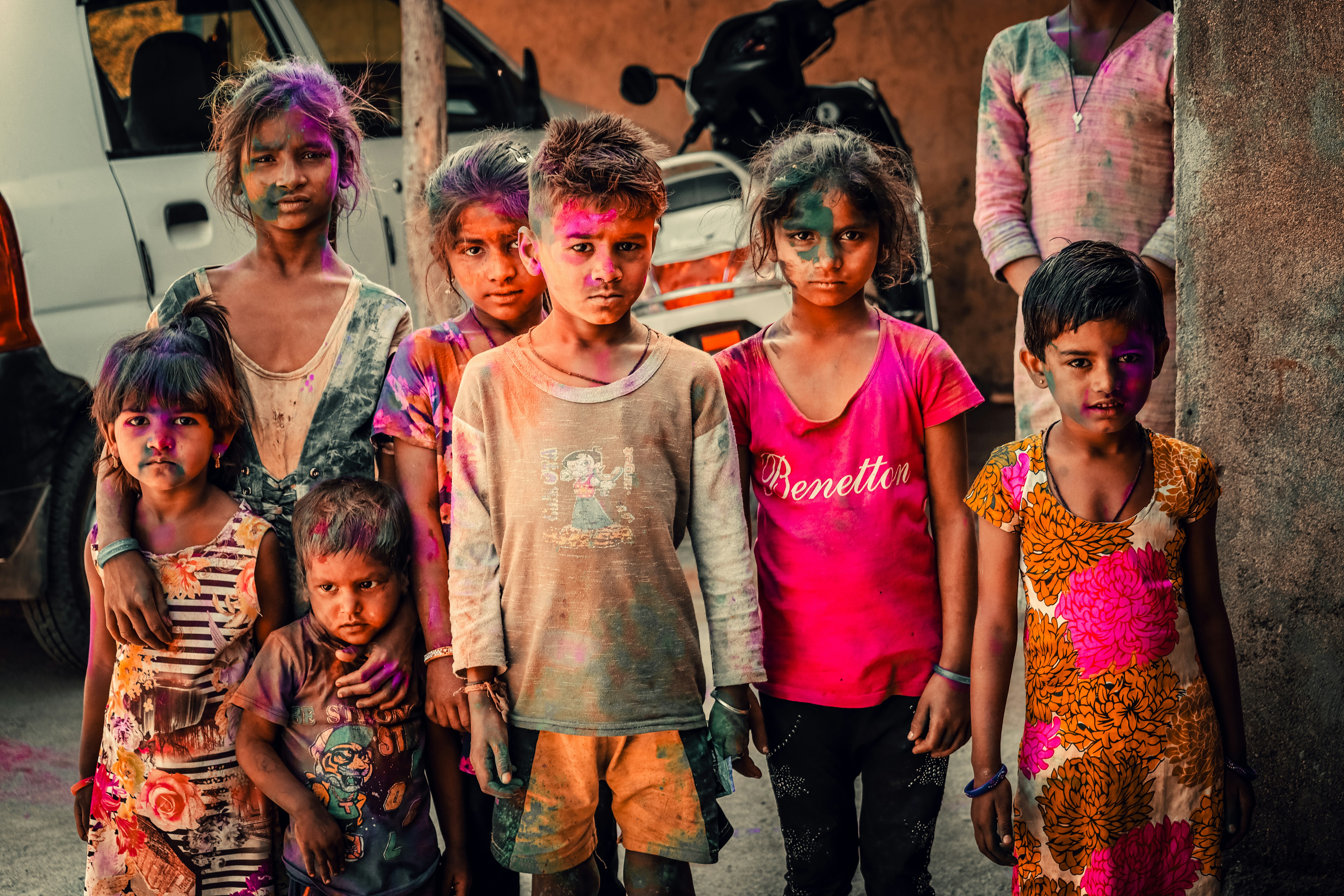 a group of young children standing next to each other