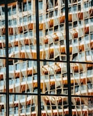 a reflection of a building in a window