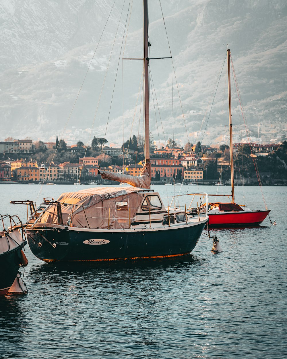 a couple of boats that are sitting in the water