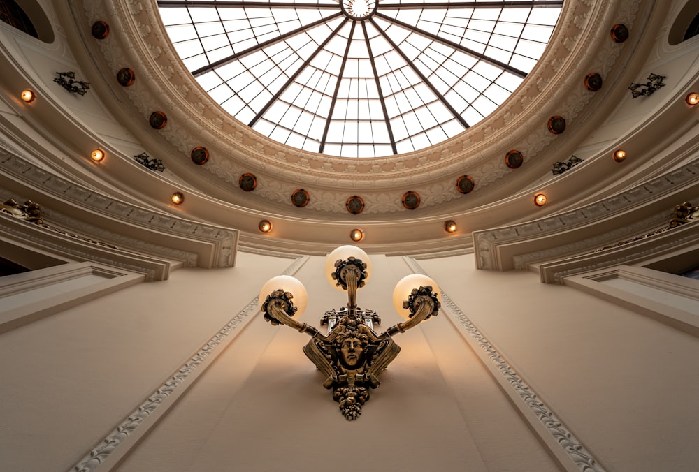 a chandelier hanging from the ceiling of a building