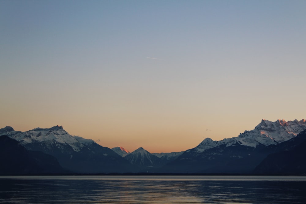 a view of a mountain range at sunset