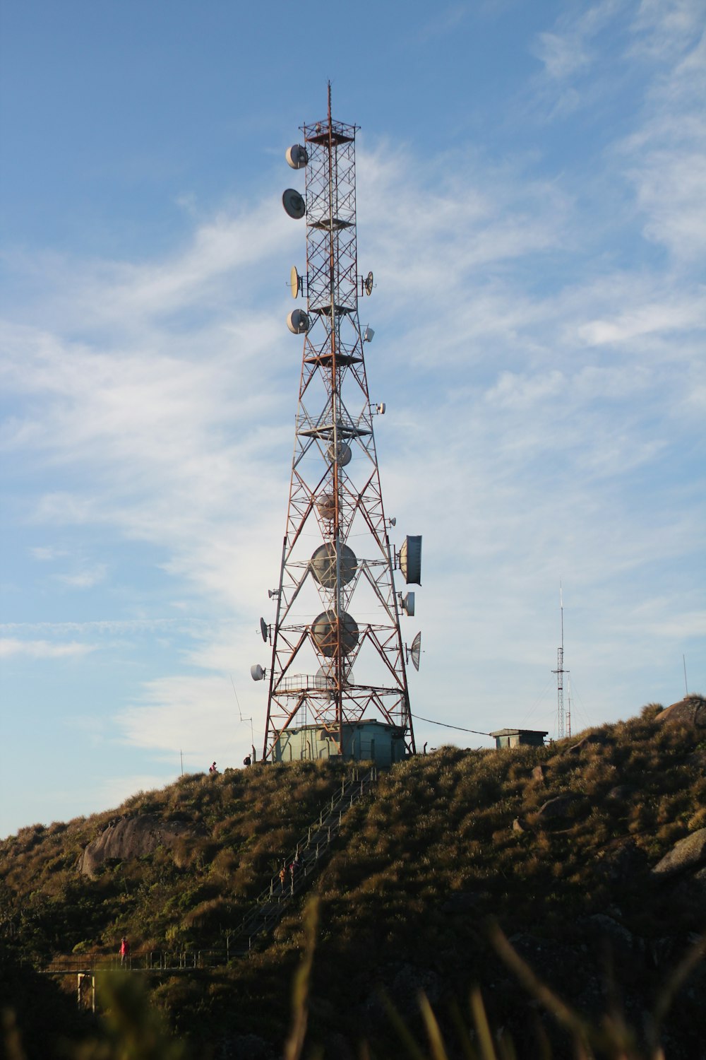 a radio tower on top of a hill