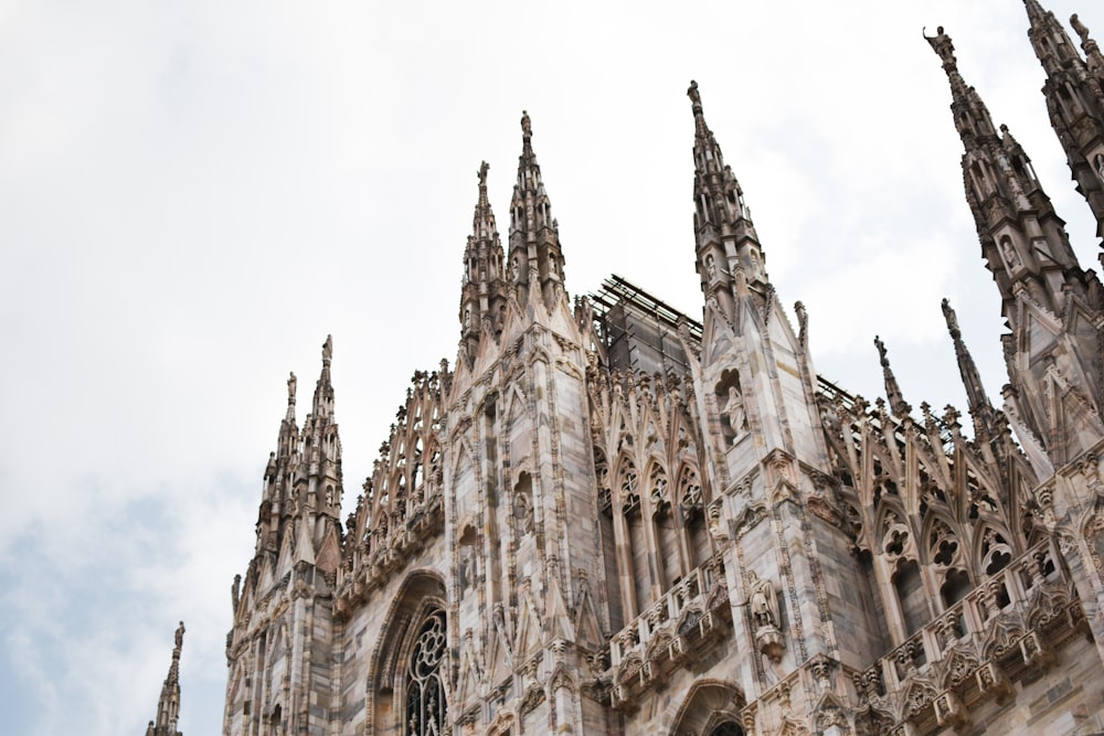 a large cathedral with a clock on the front of it