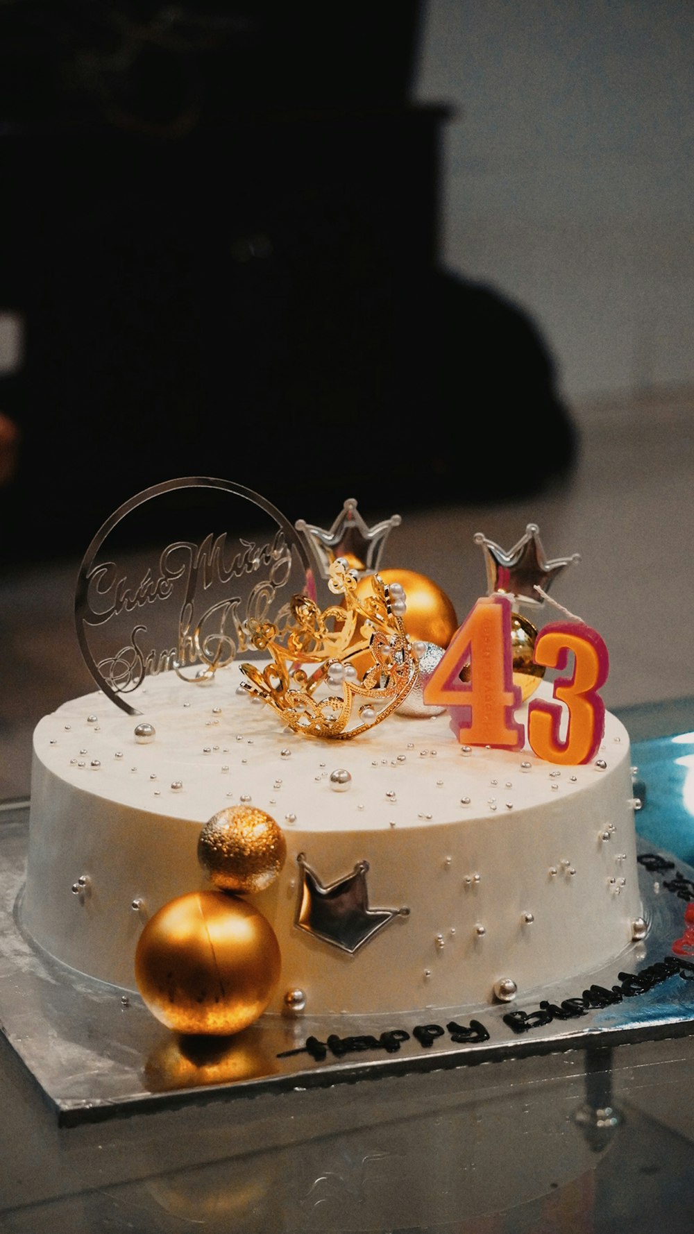 a white cake with decorations on top of it