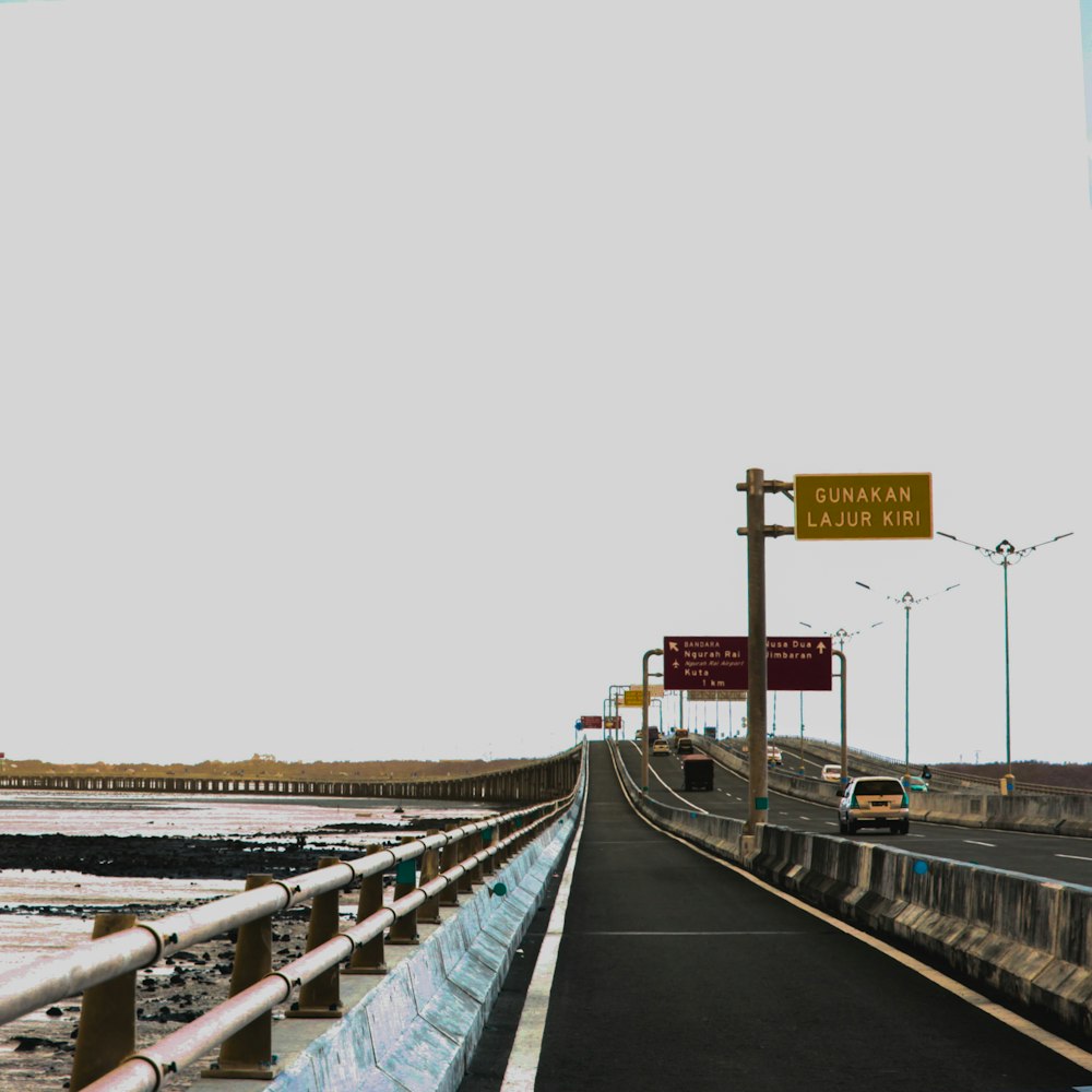 a road with a sign on the side of it