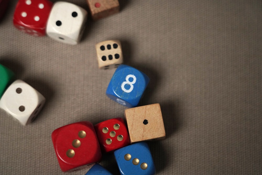 a group of dices sitting on top of a table