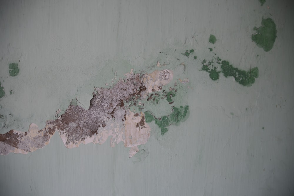 a wall that has some paint on it