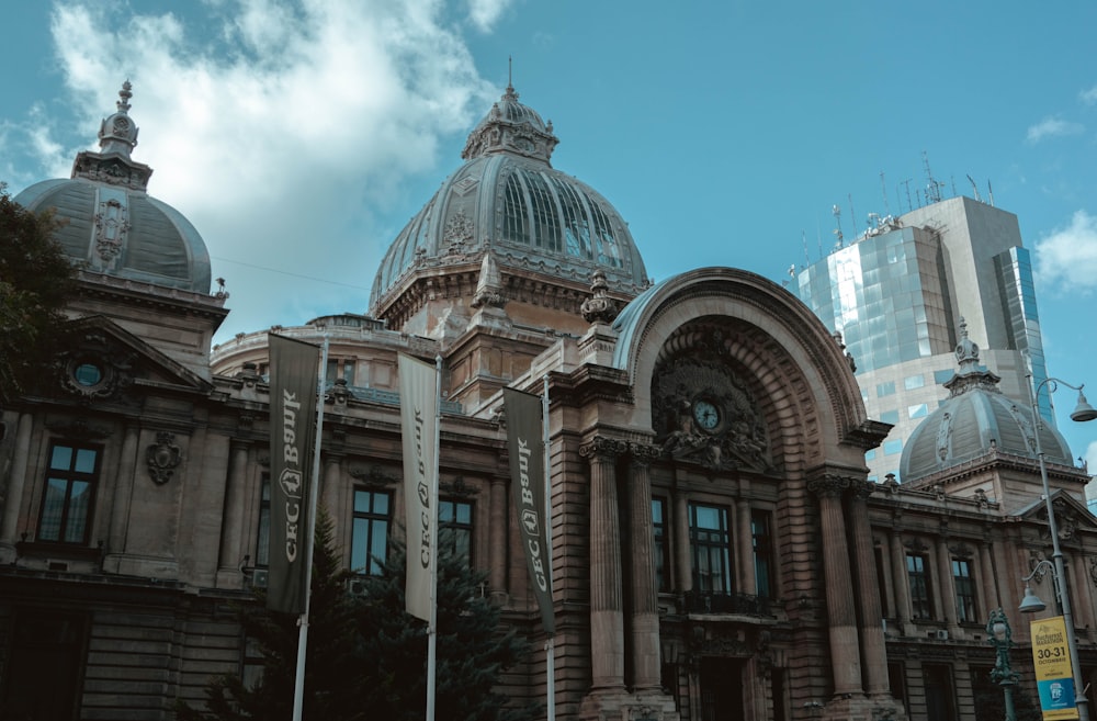 a large building with a clock on the top of it