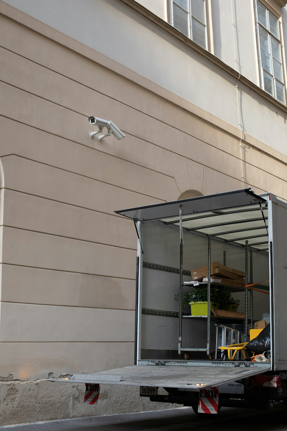 a truck with a storage compartment on the back of it