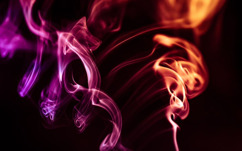 a close up of some smoke on a black background