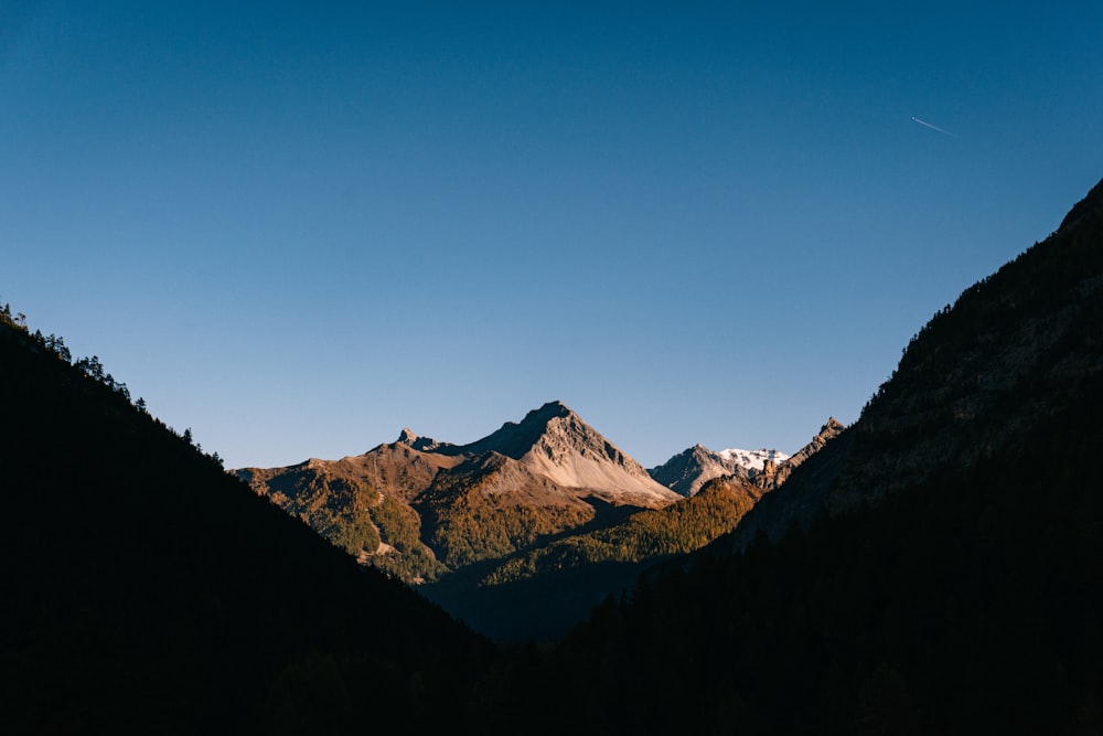 a view of a mountain range from a distance