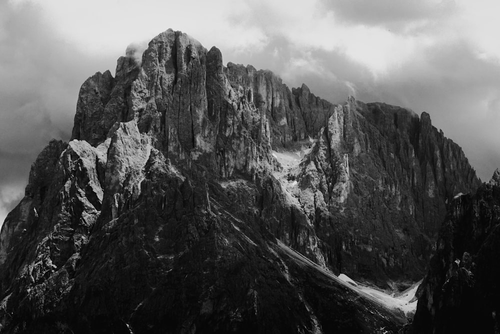 a black and white photo of a mountain