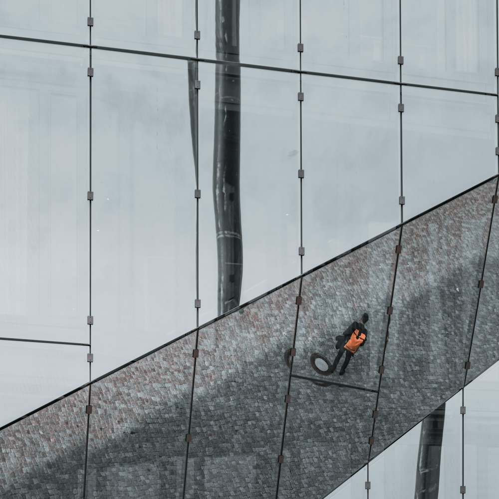 a pair of wrenches sitting on the side of a building