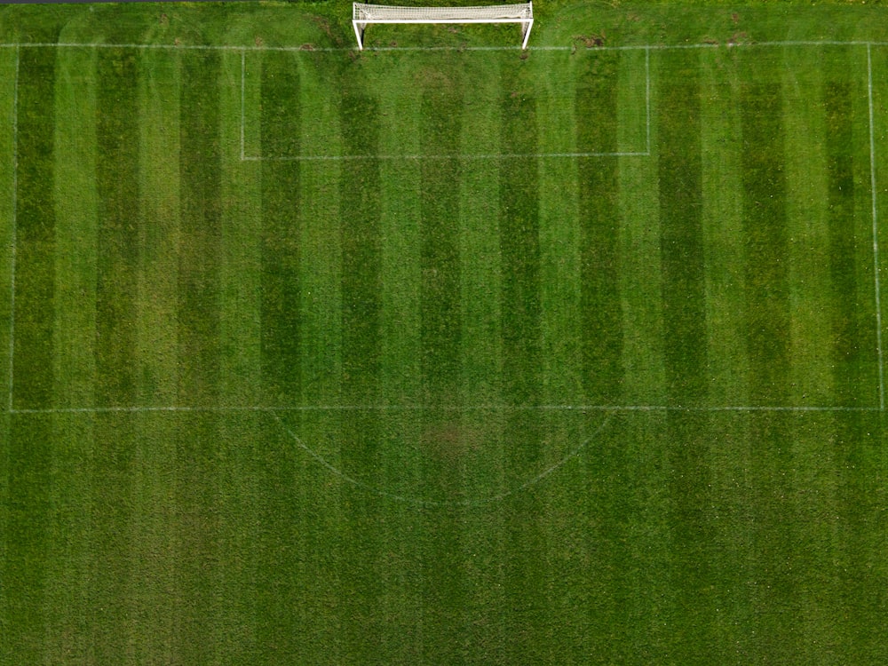 an overhead view of a soccer field with a soccer goal