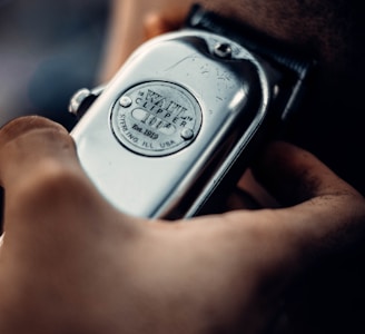 a close up of a person holding a cell phone