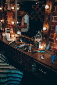 a man standing in front of a mirror in a room