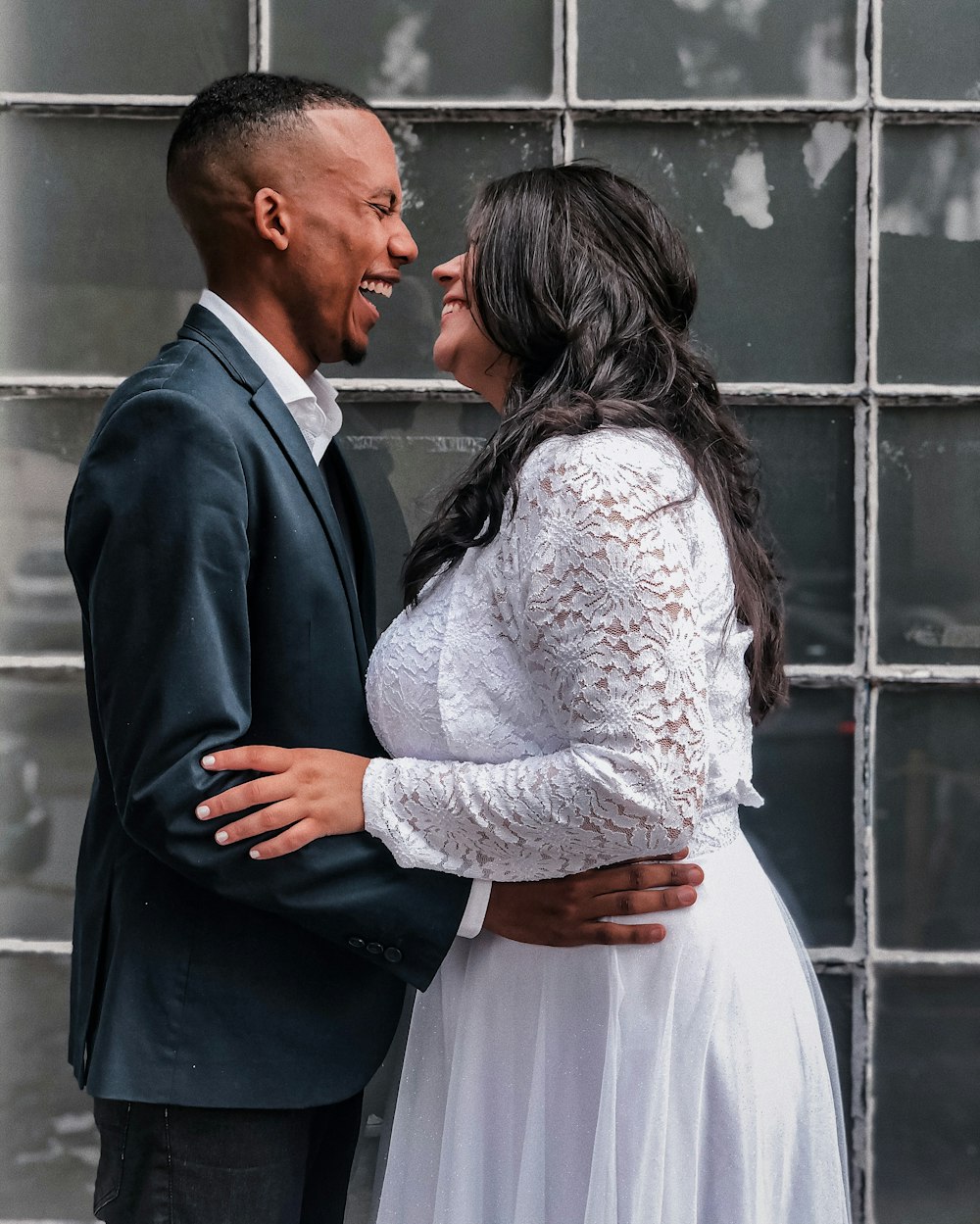 a man and a woman standing next to each other