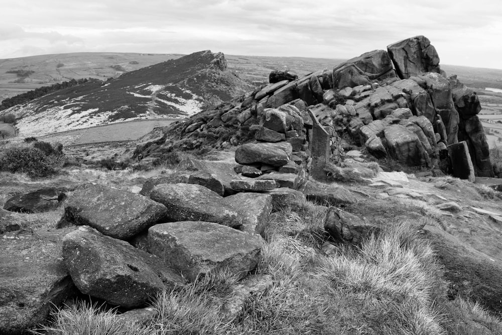 a black and white photo of a rocky mountain