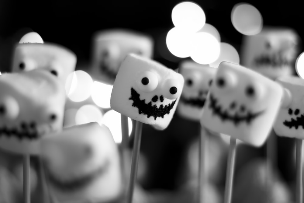 a group of marshmallows with faces on them