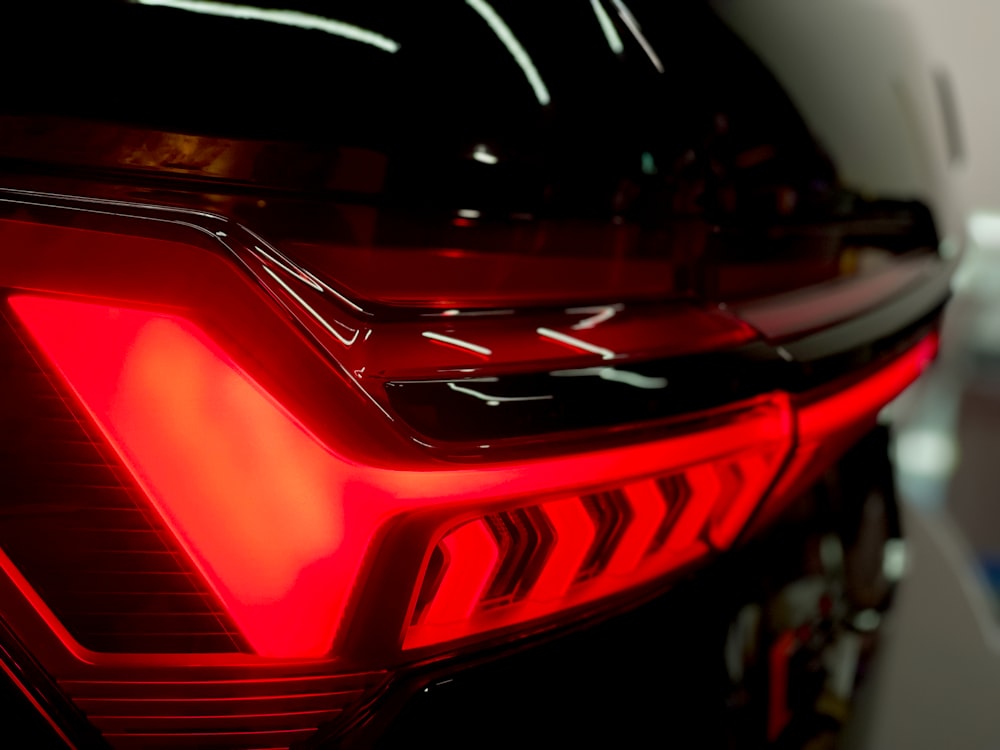 a close up of the tail lights of a car