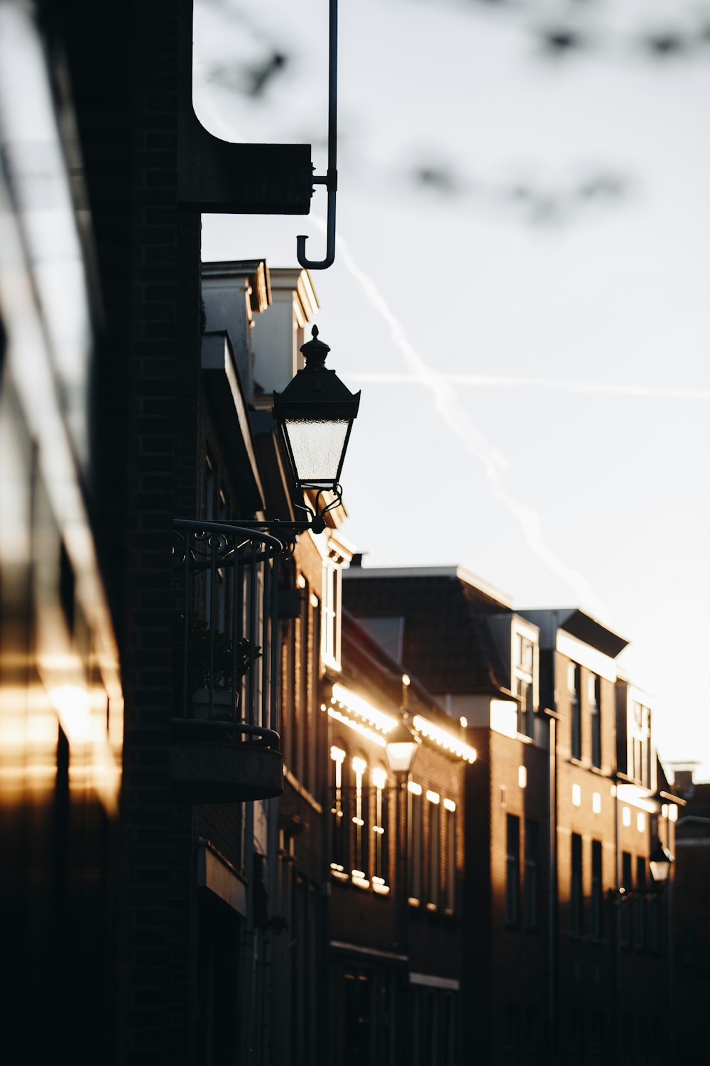 a street light on the side of a building