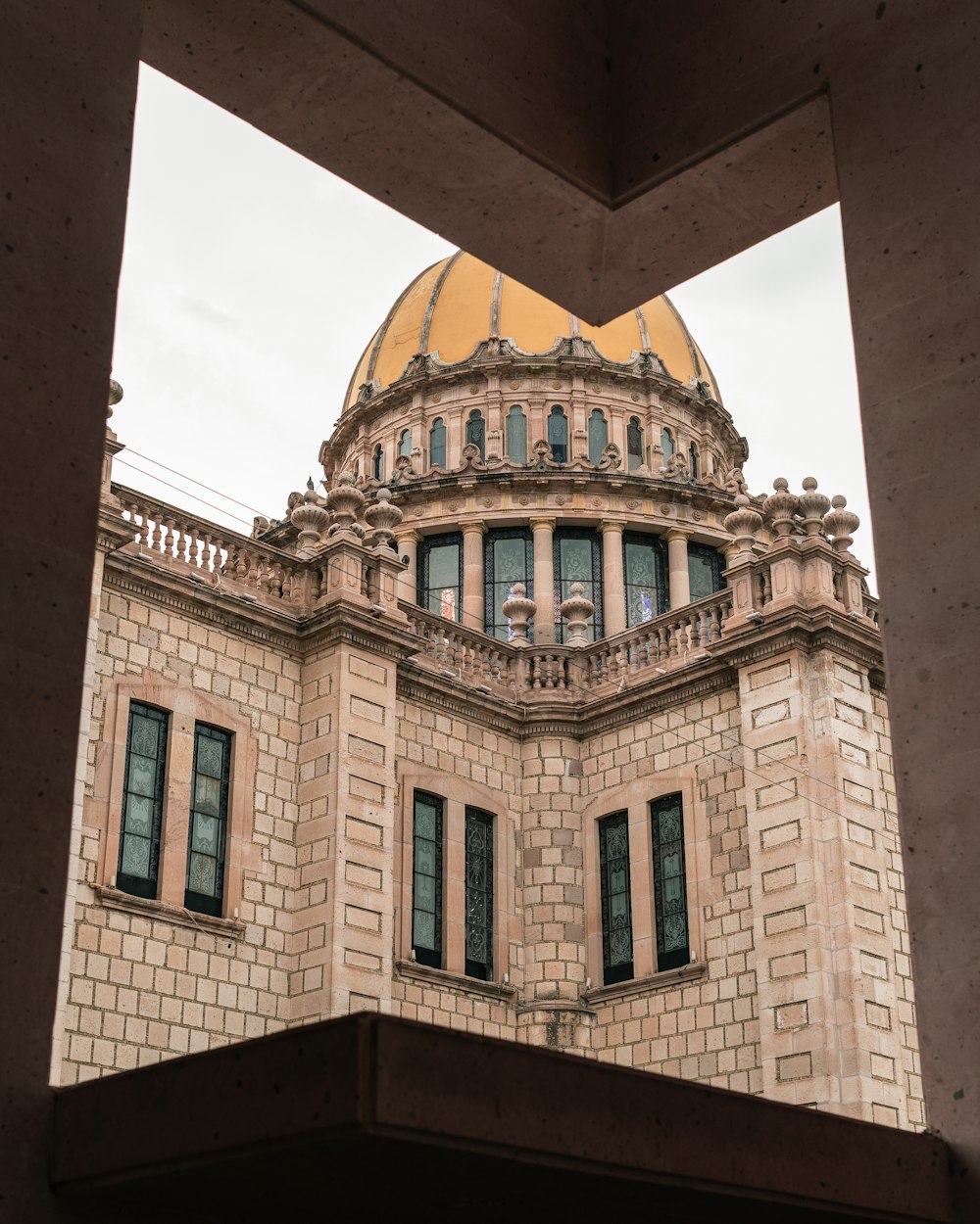 a large building with a dome on top of it