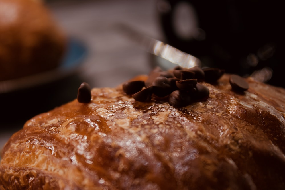 a loaf of bread with chocolate chips on top of it