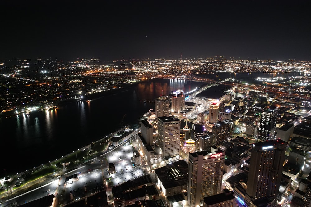 a view of a city at night from the top of a building