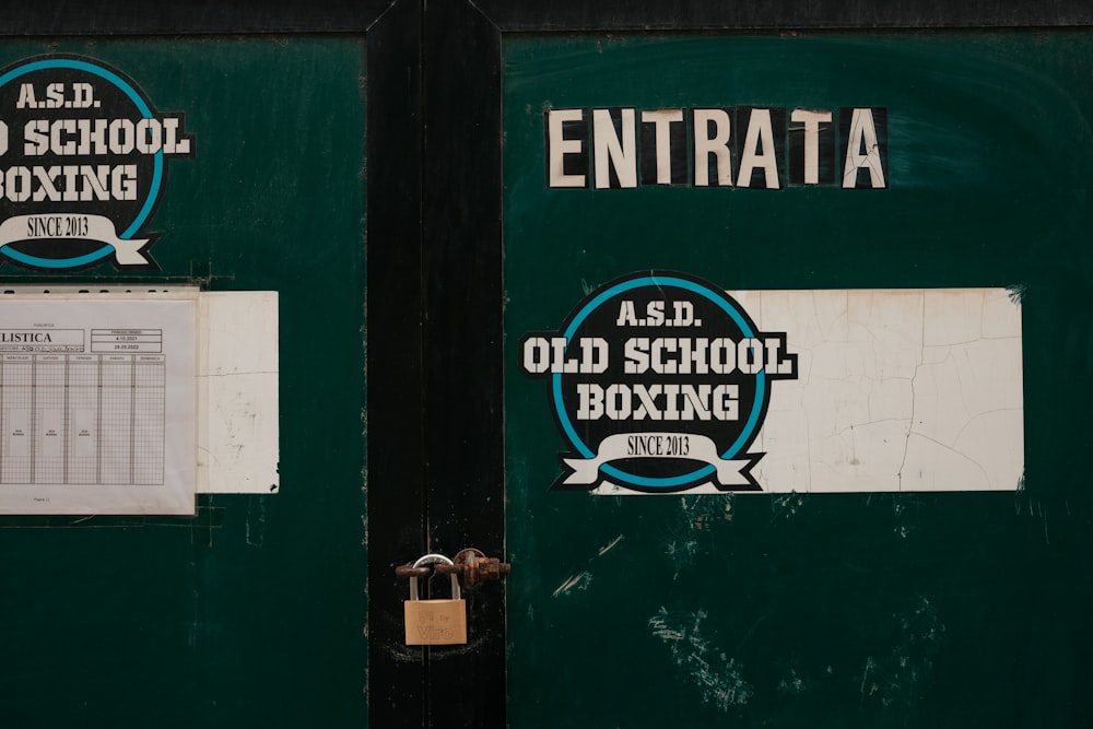 a close up of two green shipping containers