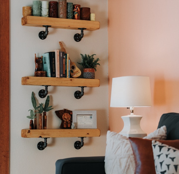 a living room filled with furniture and a lamp