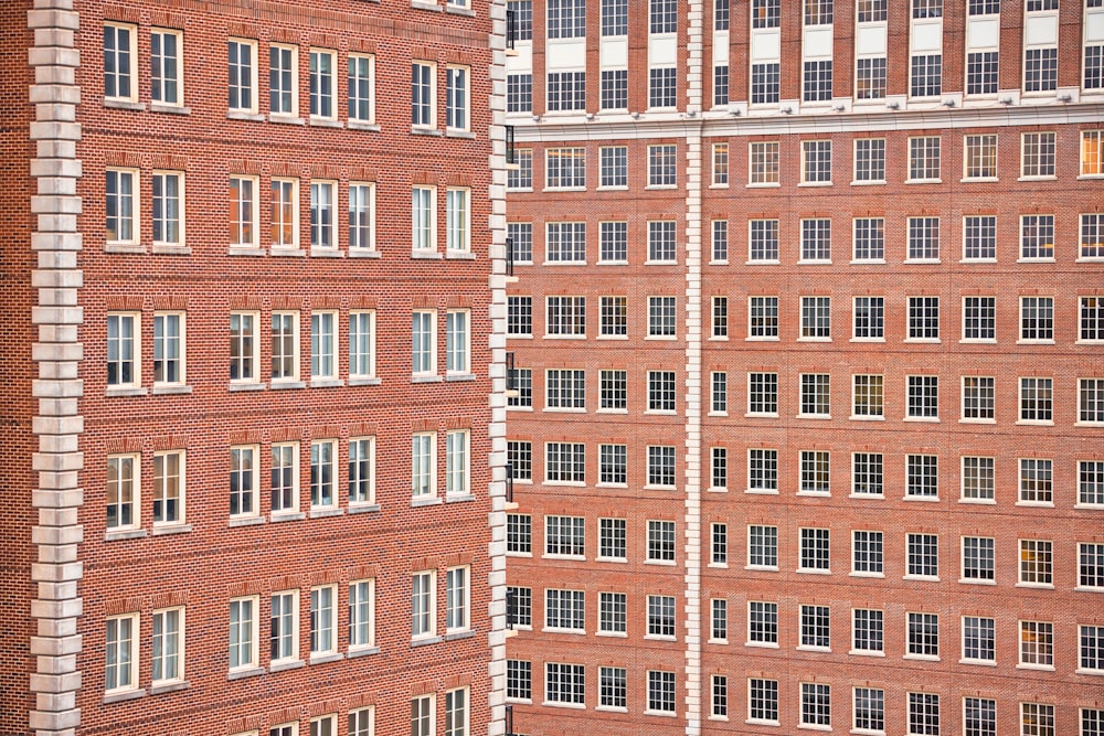 a large brick building with a clock on the side of it