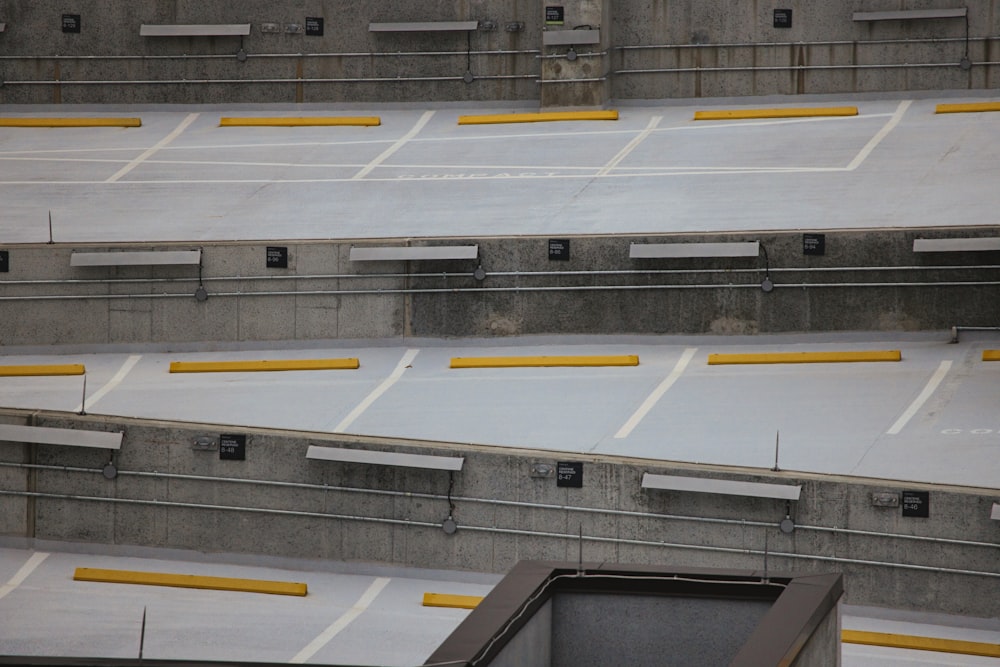 a parking lot that has a lot of benches on it