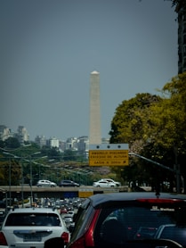 a view of the washington monument from a busy street