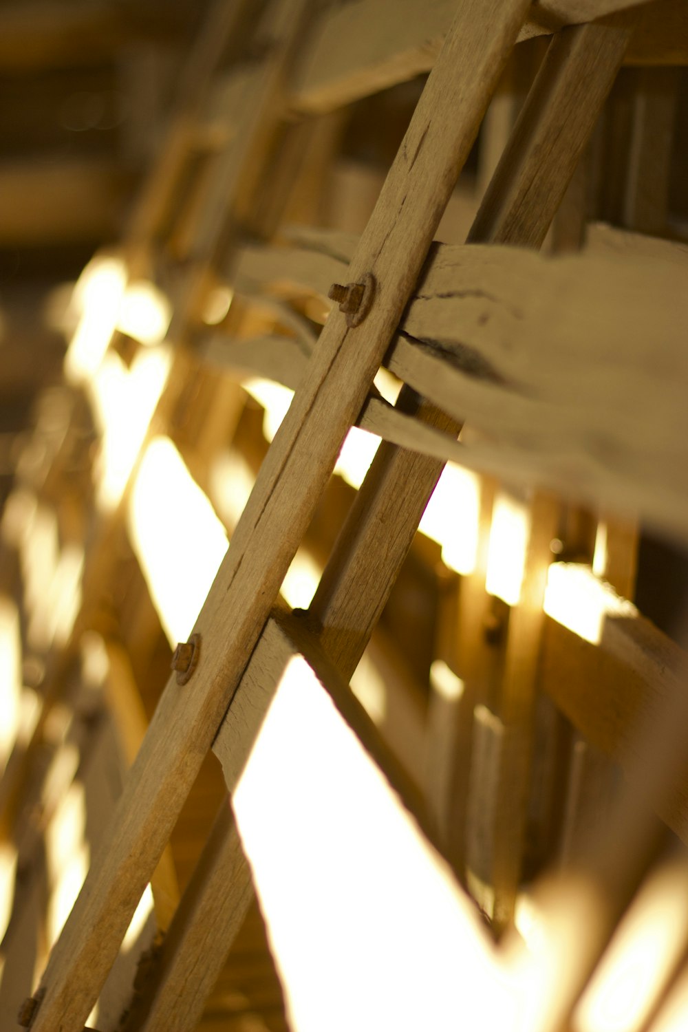 a close up of a row of wooden benches