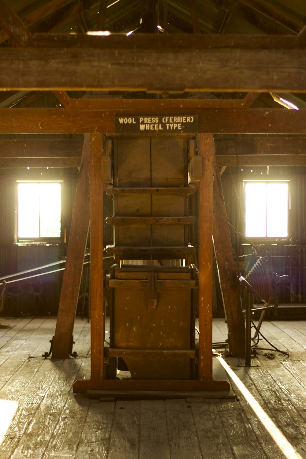 a room with a wooden structure with a sign on it