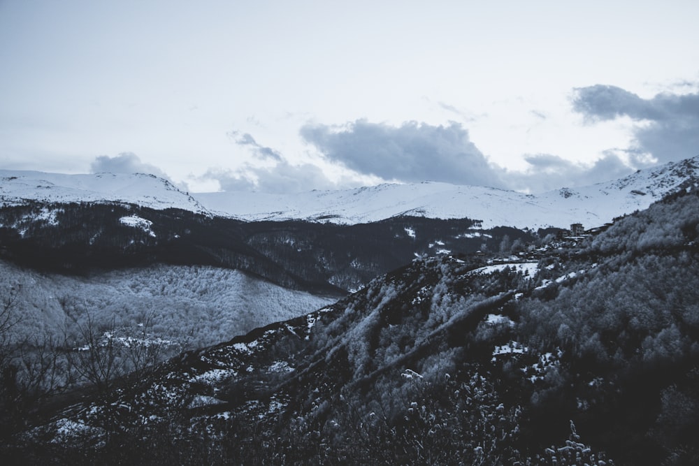 a view of a mountain range covered in snow