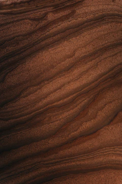 Close-up of layered tectonic plates illustrating shifting power dynamics.
