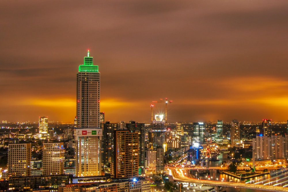 a view of a city at night from the top of a building