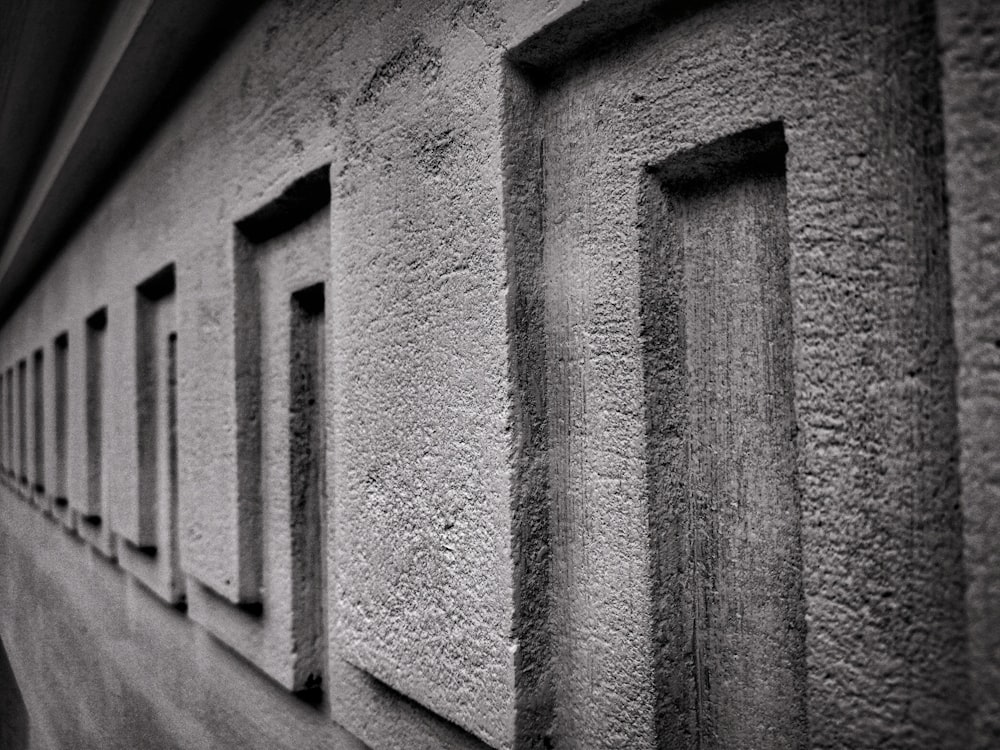 a row of windows on the side of a building