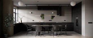a dining room with a table and chairs
