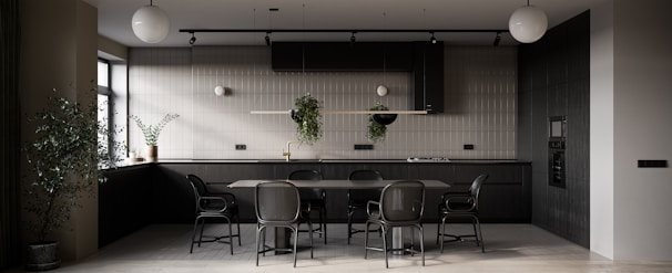 a dining room with a table and chairs
