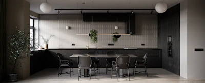 Artistic shot of a modern modular kitchen setup featuring dark wood tones and beige surfaces.