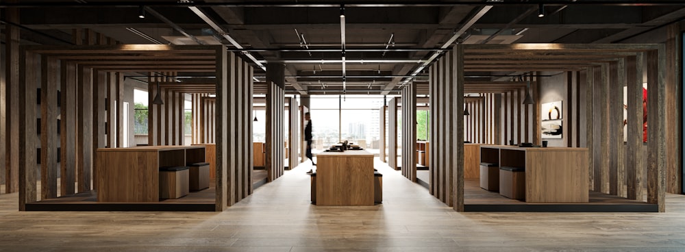 a large open room with wooden partitions
